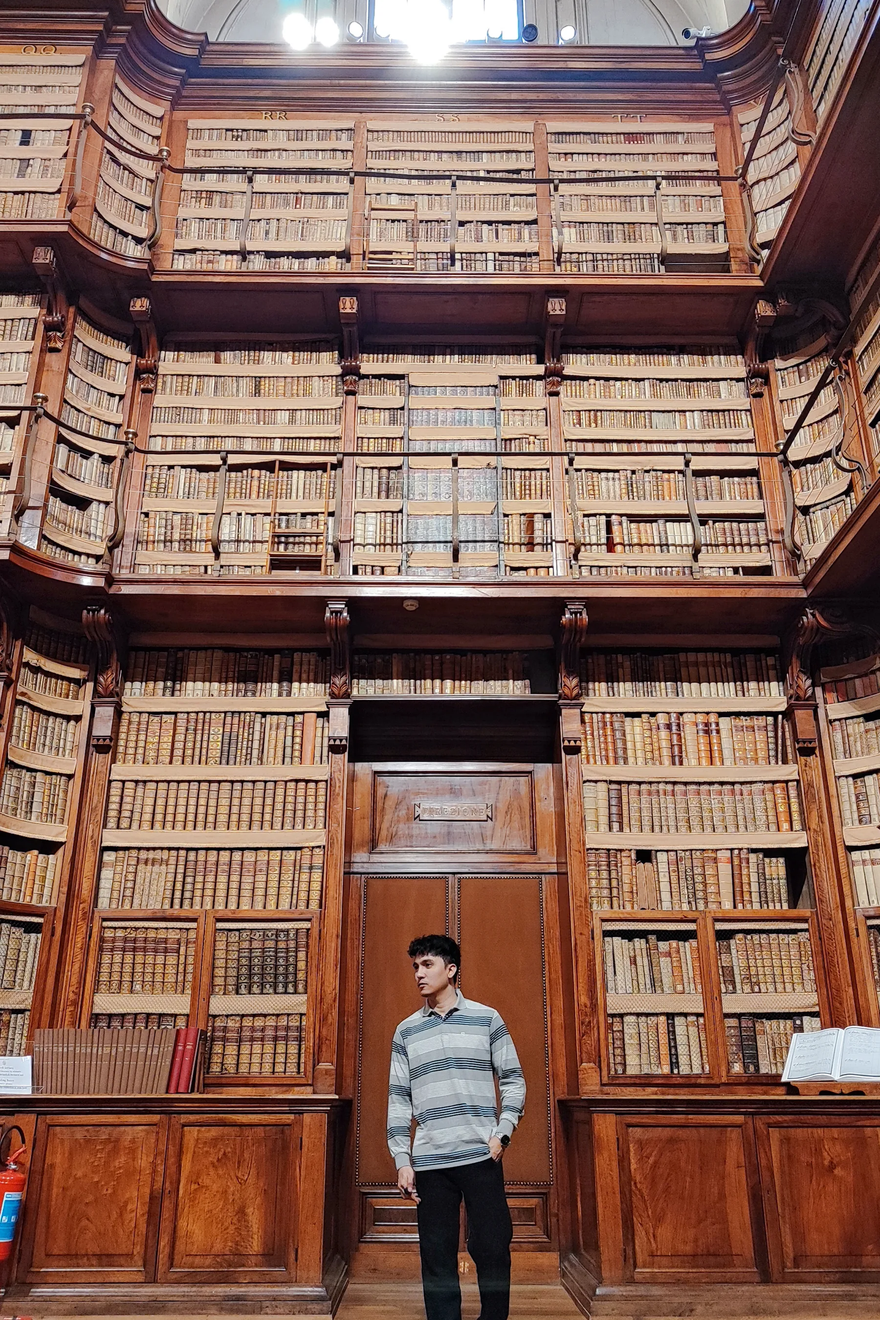 Alvin Baloloy inside the historic Biblioteca Angelica in Rome
